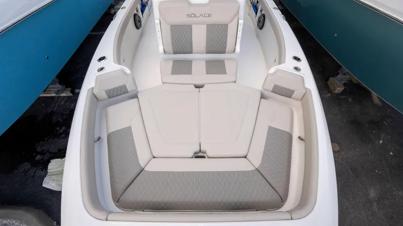 Slide: The Image of 2025 Solace 28 HCS boat interior with luxurious seating and modern design. - 3