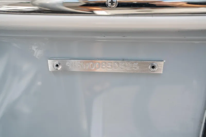 Slide: The Image of 2025 Sea Hunt Gamefish 28 CB hull identification number plate. - 33