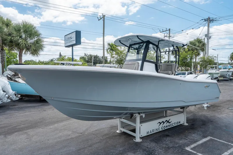 Slide: The Image of 2025 Sea Hunt Gamefish 28 CB boat displayed at Marine Connection dealership. - 6