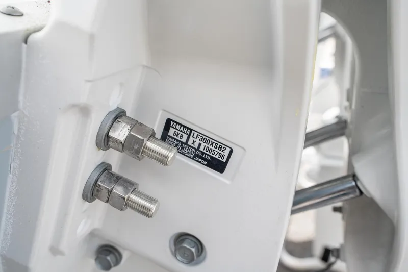 Slide: The Image of Close-up of Yamaha motor bolts on 2025 Sea Hunt Gamefish 28 CB boat. - 31