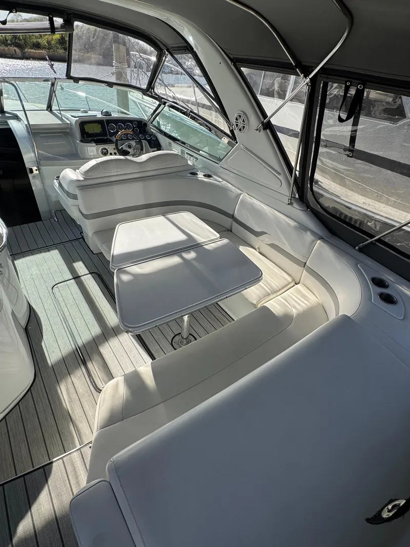 Slide: The Image of 2007 Formula 330 SS boat interior with sleek seating and modern dashboard. - 17