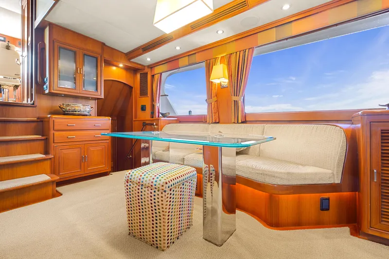 Slide: The Image of Luxurious interior of 2006 Fleming 75 yacht with elegant wood finishes and modern furnishings. - 6
