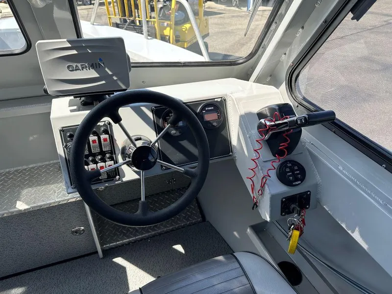 Slide: The Image of Interior of 2016 Hewescraft 220 Ocean Pro HT BH boat with Garmin navigation system. - 6