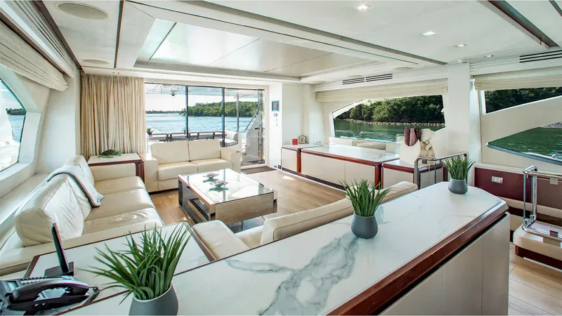 Slide: The Image of Luxurious interior of 2010 Azimut 95 yacht with elegant furnishings and scenic views. - 13