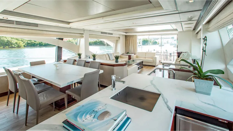 Slide: The Image of Luxurious interior of 2010 Azimut 95 yacht with elegant dining and lounge area. - 14