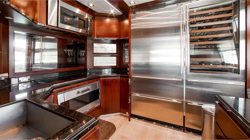 Slide: The Image of Luxurious kitchen interior of 2010 Azimut 95 yacht with stainless steel appliances. - 15