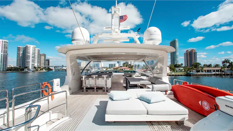 Slide: The Image of Luxurious 2010 Azimut 95 yacht deck with city skyline and blue sky. - 4