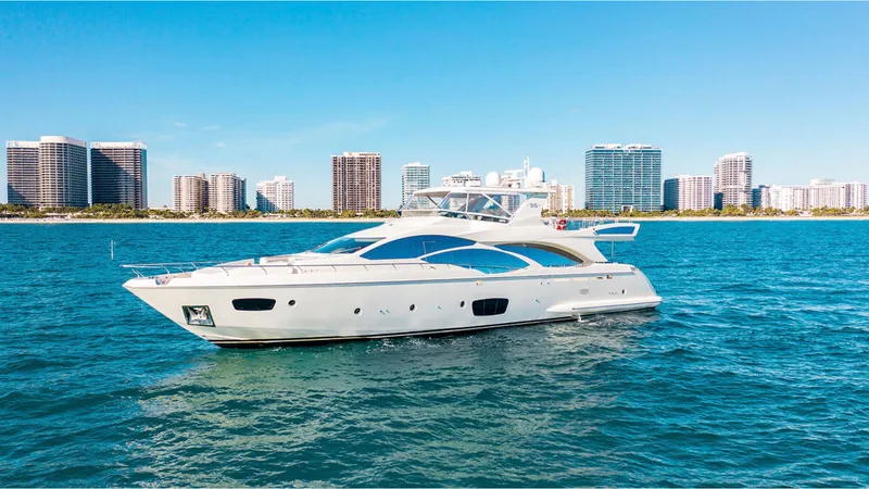 Slide: The Image of Azimut 95 yacht from 2010 cruising near city skyline on a sunny day. - 6