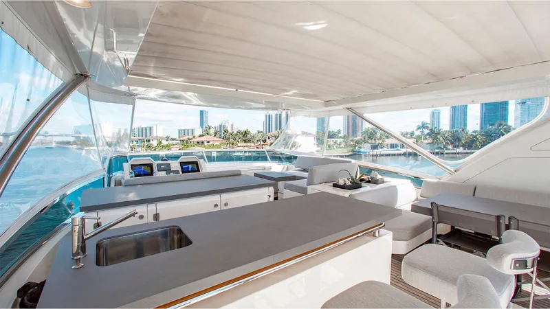 Slide: The Image of Luxurious Azimut 95 yacht interior with modern amenities, city skyline view, 2010 model. - 9