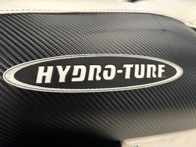 Slide: The Image of Hydro-Turf logo on black carbon fiber texture, Sea-Doo GTI 2000 model. - 5