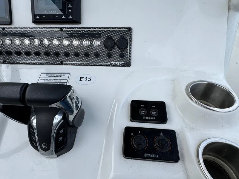 Slide: The Image of Control panel of 2022 Tidewater 292 CC Adventure boat with Yamaha controls. - 16