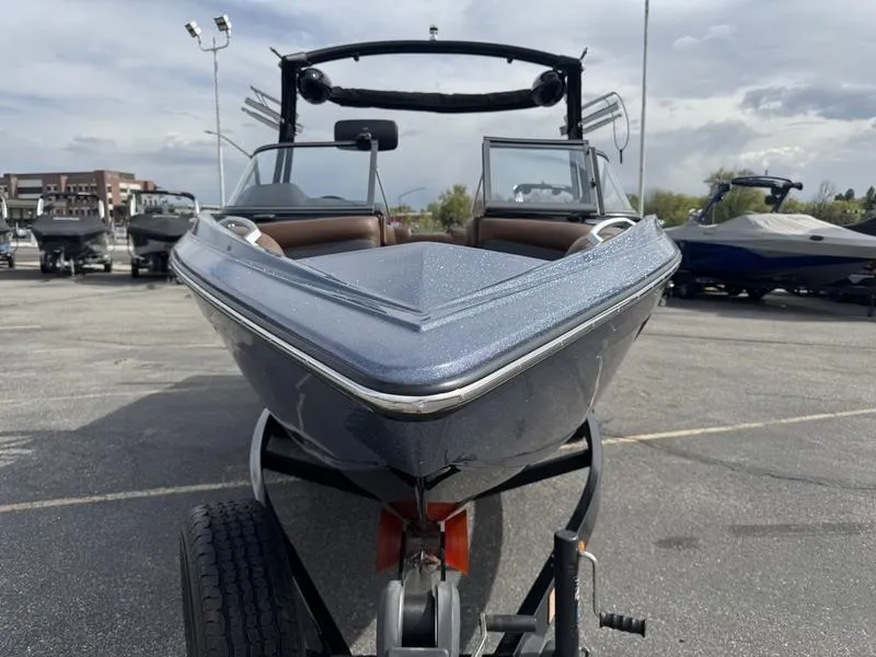 Slide: The Image of 2018 Tigé R21 boat on trailer in parking lot, front view. - 6