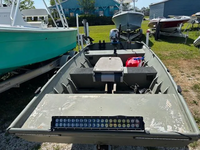 Slide: The Image of 2016 Crestliner CR 1448T boat with LED light bar, parked outdoors. - 7