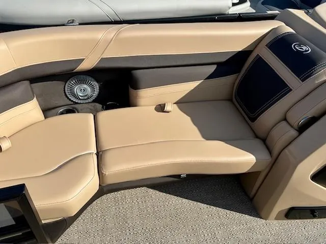 Slide: The Image of Luxurious seating on 2025 Barletta C24UE boat, featuring beige upholstery and modern design. - 2