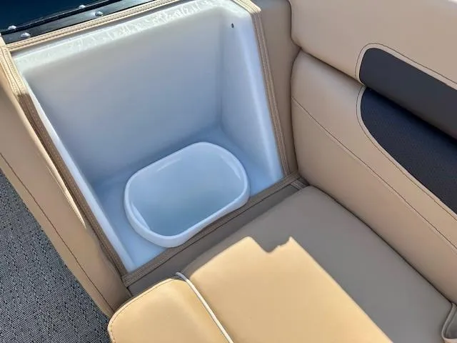 Slide: The Image of 2025 Barletta C24UE boat seat with built-in cooler compartment. - 20