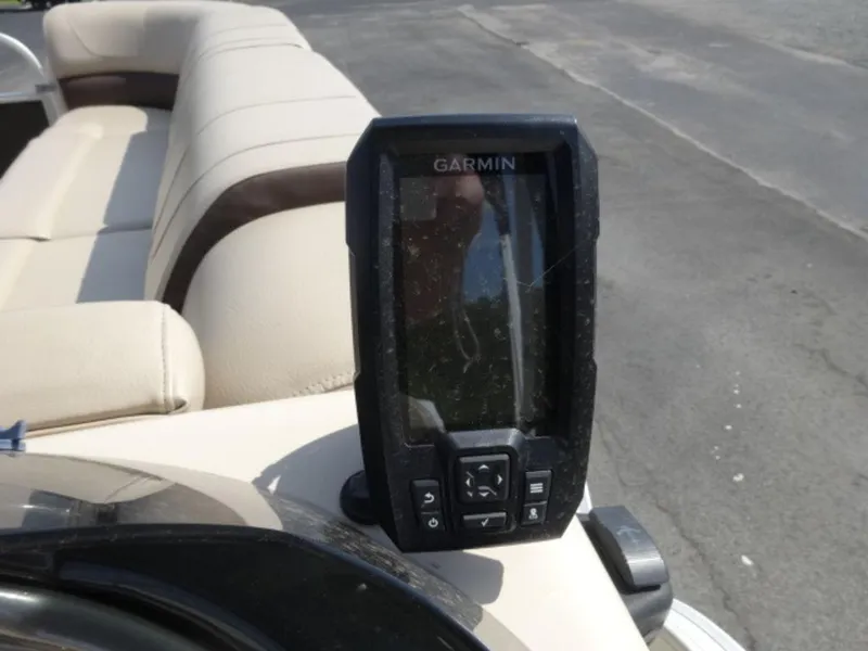 Slide: The Image of Garmin device on 2018 Sun Tracker 24XP3 boat with beige seating. - 12