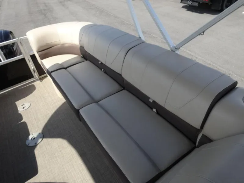 Slide: The Image of 2018 Sun Tracker 24XP3 pontoon boat with spacious beige seating. - 13