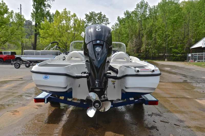 Slide: The Image of 2016 Nitro Z-7 Sport boat on trailer, rear view, parked outdoors. - 13