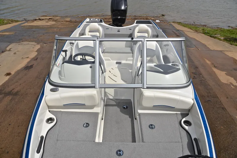 Slide: The Image of 2016 Nitro Z-7 Sport boat with sleek design, docked by the water. - 23