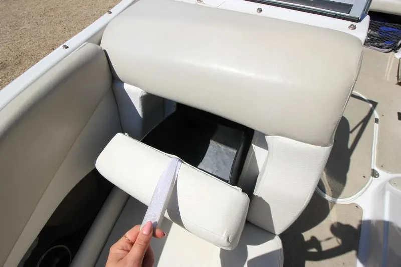 Slide: The Image of 2011 Glastron GLS 215 boat seat with storage compartment, white upholstery. - 20