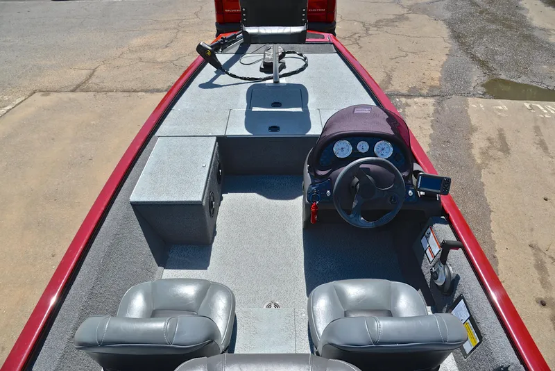 Slide: The Image of 2019 Bass Tracker Pro 170 boat interior with steering console and seating. - 20