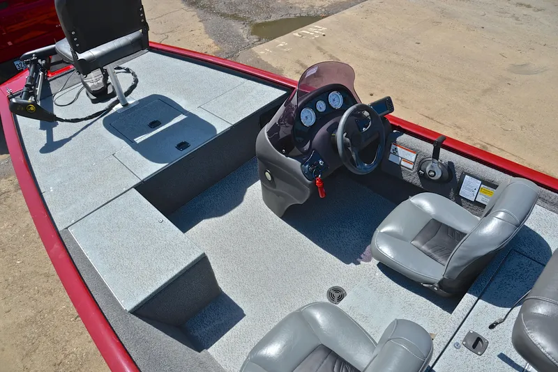 Slide: The Image of 2019 Bass Tracker Pro 170 boat interior with steering console and seating. - 23