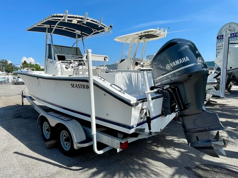 Slide: The Image of 2002 Seastrike 240 boat with Yamaha outboard motor on a trailer. - 3