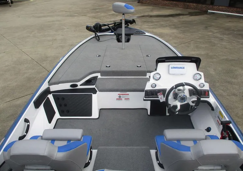 Slide: The Image of 2025 Nitro Z18 boat interior with steering wheel, seats, and control panel. - 6