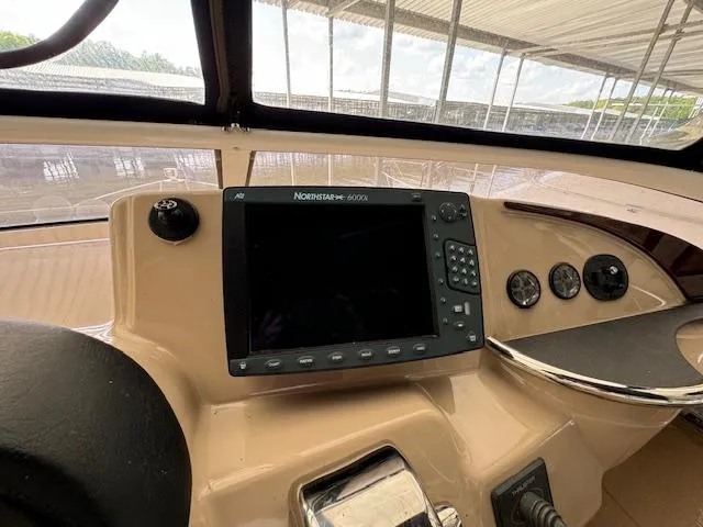 Slide: The Image of Control panel of a 2006 Carver 36 Motor Yacht with navigation equipment. - 14