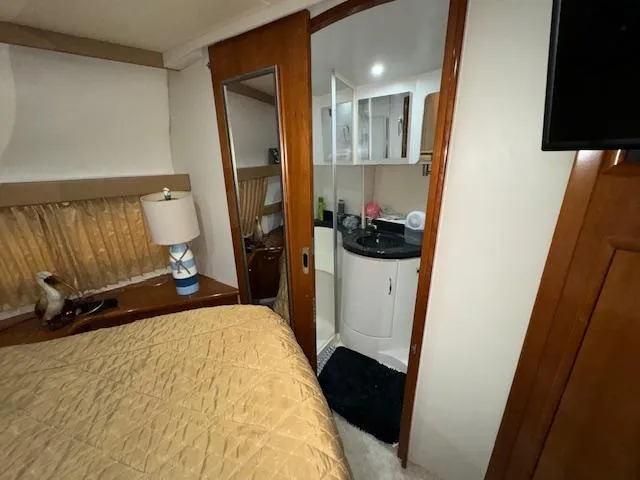 Slide: The Image of Interior of 2006 Carver 36 Motor Yacht with bedroom and bathroom view. - 43