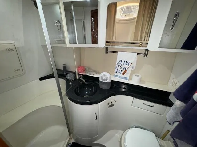 Slide: The Image of Bathroom interior of 2006 Carver 36 Motor Yacht with modern amenities. - 44