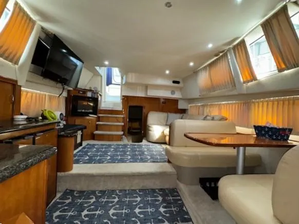 Slide: The Image of Interior of 2006 Carver 36 Motor Yacht with cozy seating and modern amenities. - 34