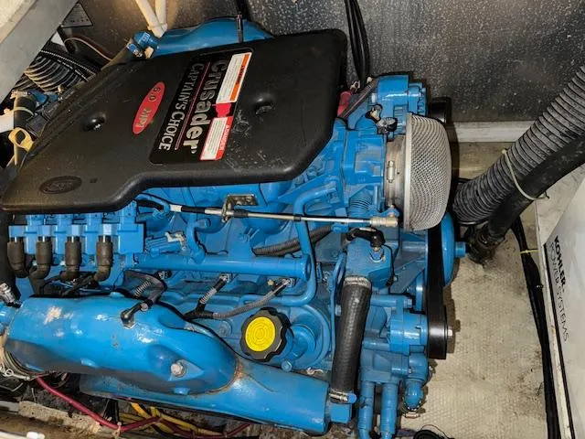 Slide: The Image of Engine of a 2006 Carver 36 Motor Yacht, featuring a Crusader Captain's Choice. - 48