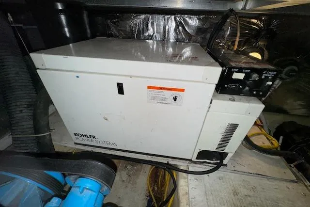 Slide: The Image of Kohler power system in 2006 Carver 36 Motor Yacht engine room. - 58