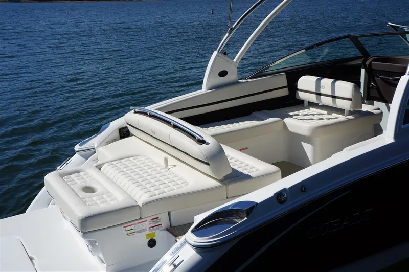 Slide: The Image of 2017 Cobalt R7 boat with luxurious white seating on a calm lake. - 5
