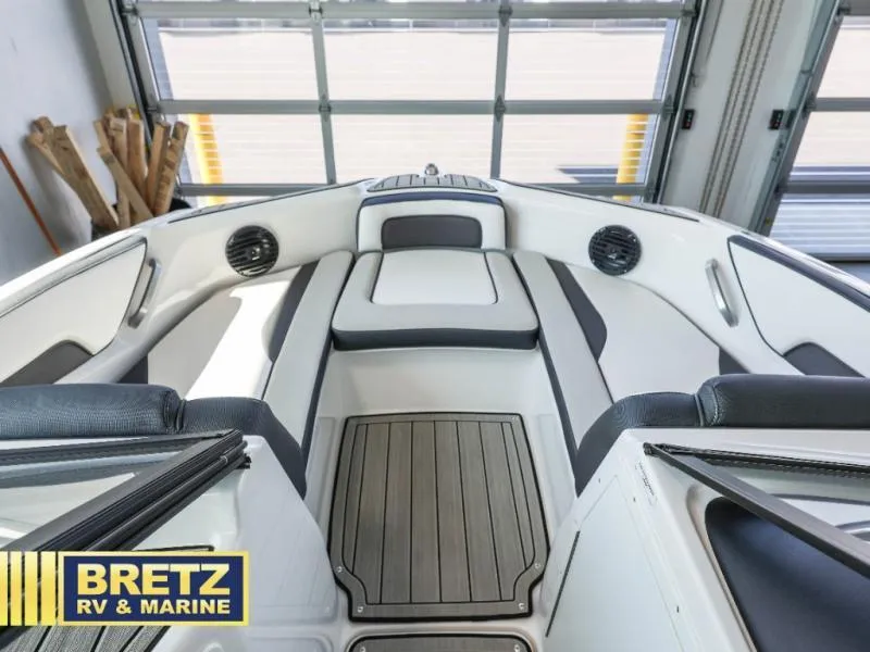 Slide: The Image of 2024 Model 195 S boat interior with sleek seating and modern design. - 12
