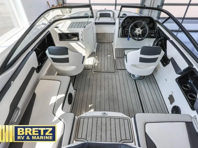 Slide: The Image of 2024 Model 195 S boat interior with modern seating and steering, showcased by Bretz RV & Marine. - 6