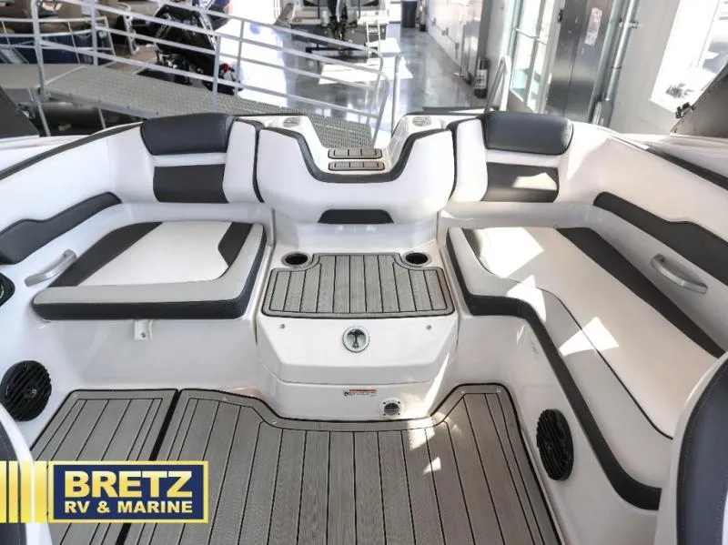 Slide: The Image of 2024 Model 195 S boat interior with cushioned seating and sleek design at Bretz RV & Marine. - 7