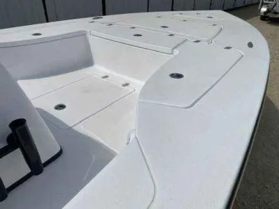 Slide: The Image of 2025 Blazer 675 Ultimate Bay boat deck with storage compartments. - 11