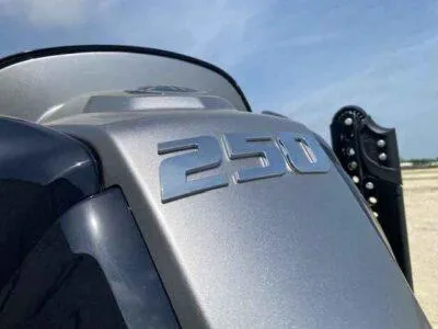 Slide: The Image of Close-up of a 2025 Blazer 675 Ultimate Bay engine with "250" emblem. - 4