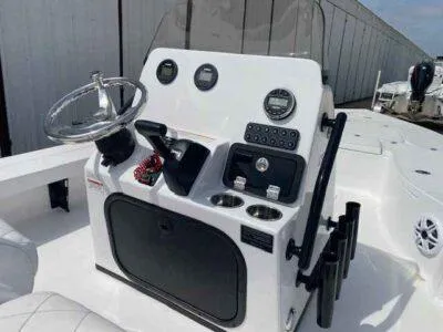 Slide: The Image of 2025 Blazer 675 Ultimate Bay boat console with steering wheel and controls. - 8