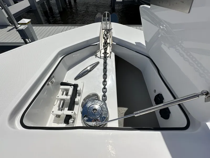 Slide: The Image of 2023 HCB 39 Speciale boat anchor compartment with chain and winch system. - 14