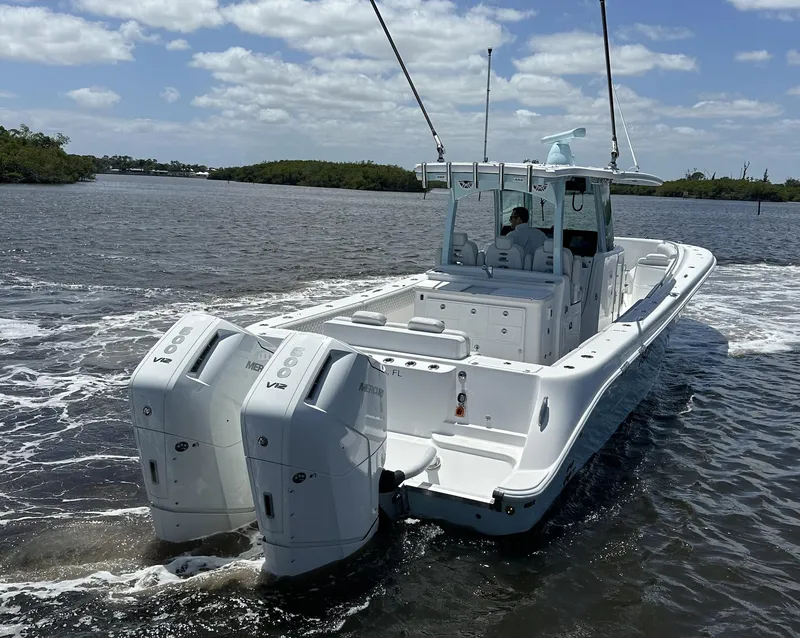 Slide: The Image of 2023 HCB 39 Speciale boat cruising on a sunny day with twin engines. - 20