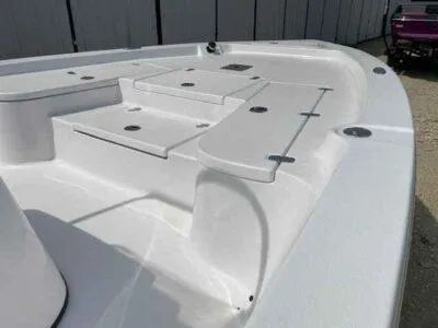 Slide: The Image of 2025 Blazer Bay 2220 Fisherman boat deck with storage compartments and seating. - 10