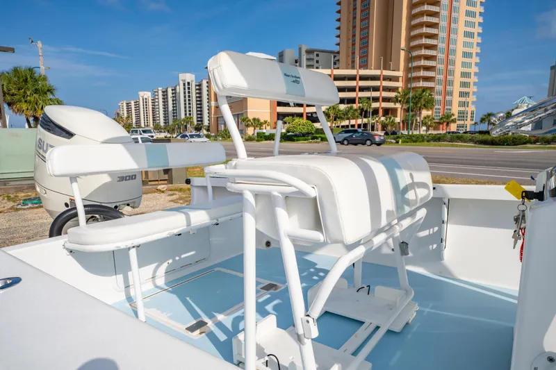 Slide: The Image of 2016 Albury Brothers 23 boat interior with seating, near waterfront buildings. - 17