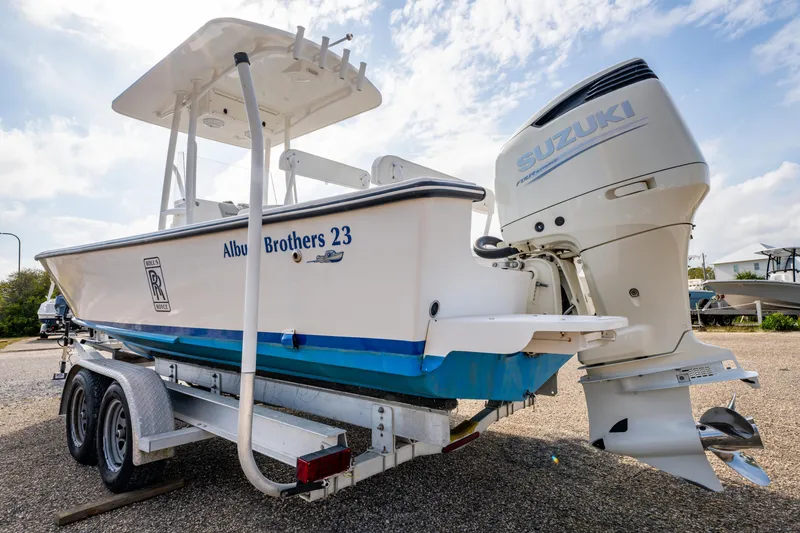 Slide: The Image of 2016 Albury Brothers 23 boat on trailer with Suzuki outboard motor. - 6