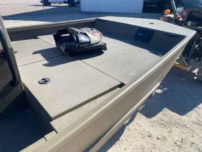 Slide: The Image of 2025 G3 Gator Tough 18 CCJ boat, spacious deck, outdoor setting. - 6