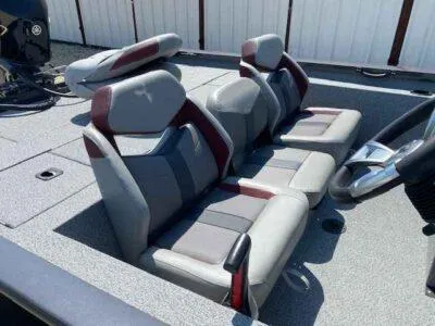 Slide: The Image of 2025 G3 Sportsman 1710 boat interior with gray and maroon seating. - 8