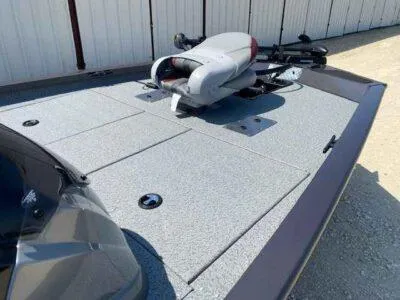 Slide: The Image of 2025 G3 Sportsman 1710 boat deck with mounted seat and storage compartments. - 9