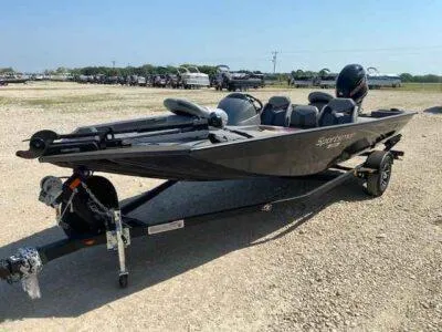 Slide: The Image of 2025 G3 Sportsman 1710 PFX boat on trailer, parked outdoors. - 3
